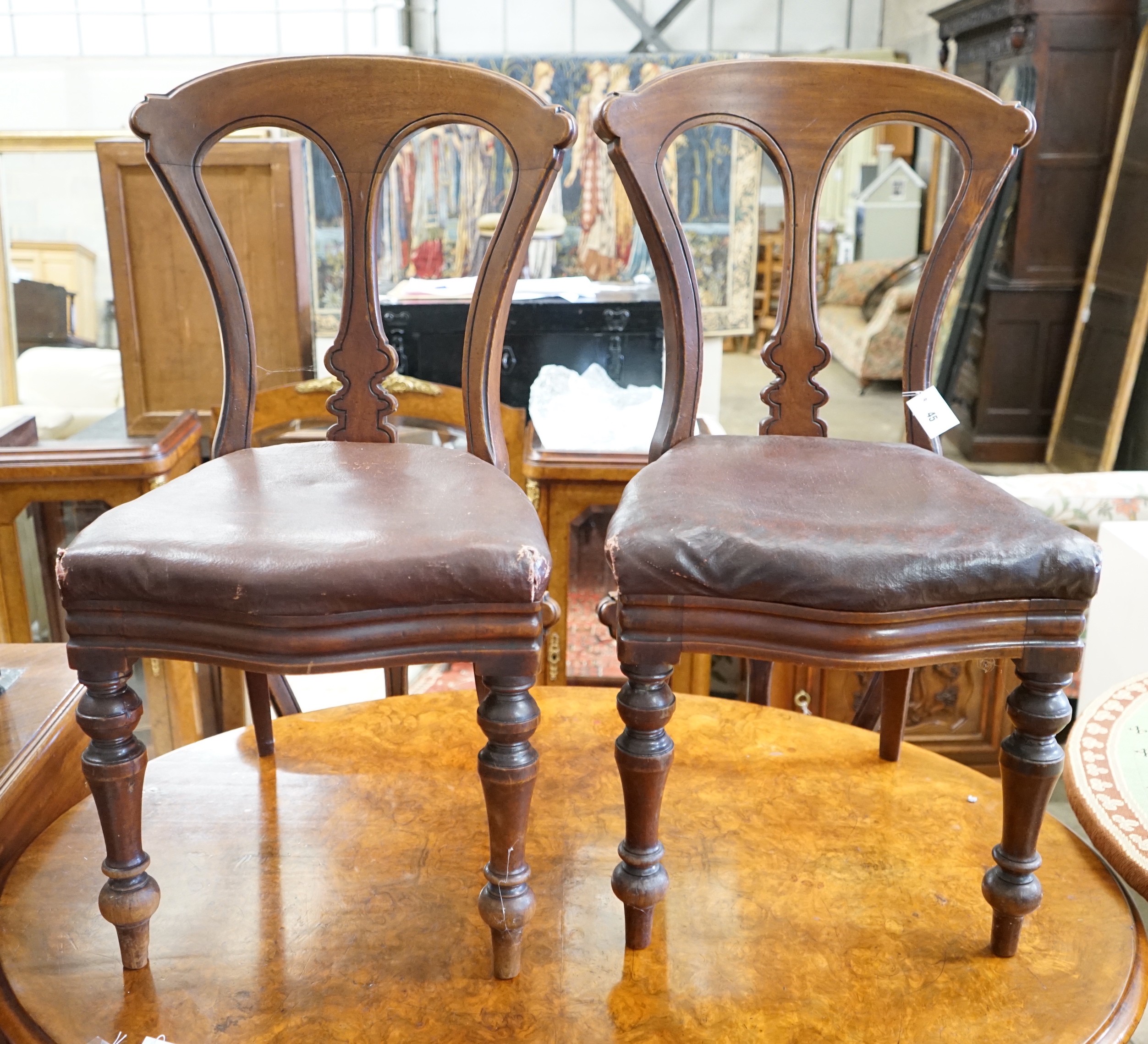 A set of six Victorian mahogany dining chairs